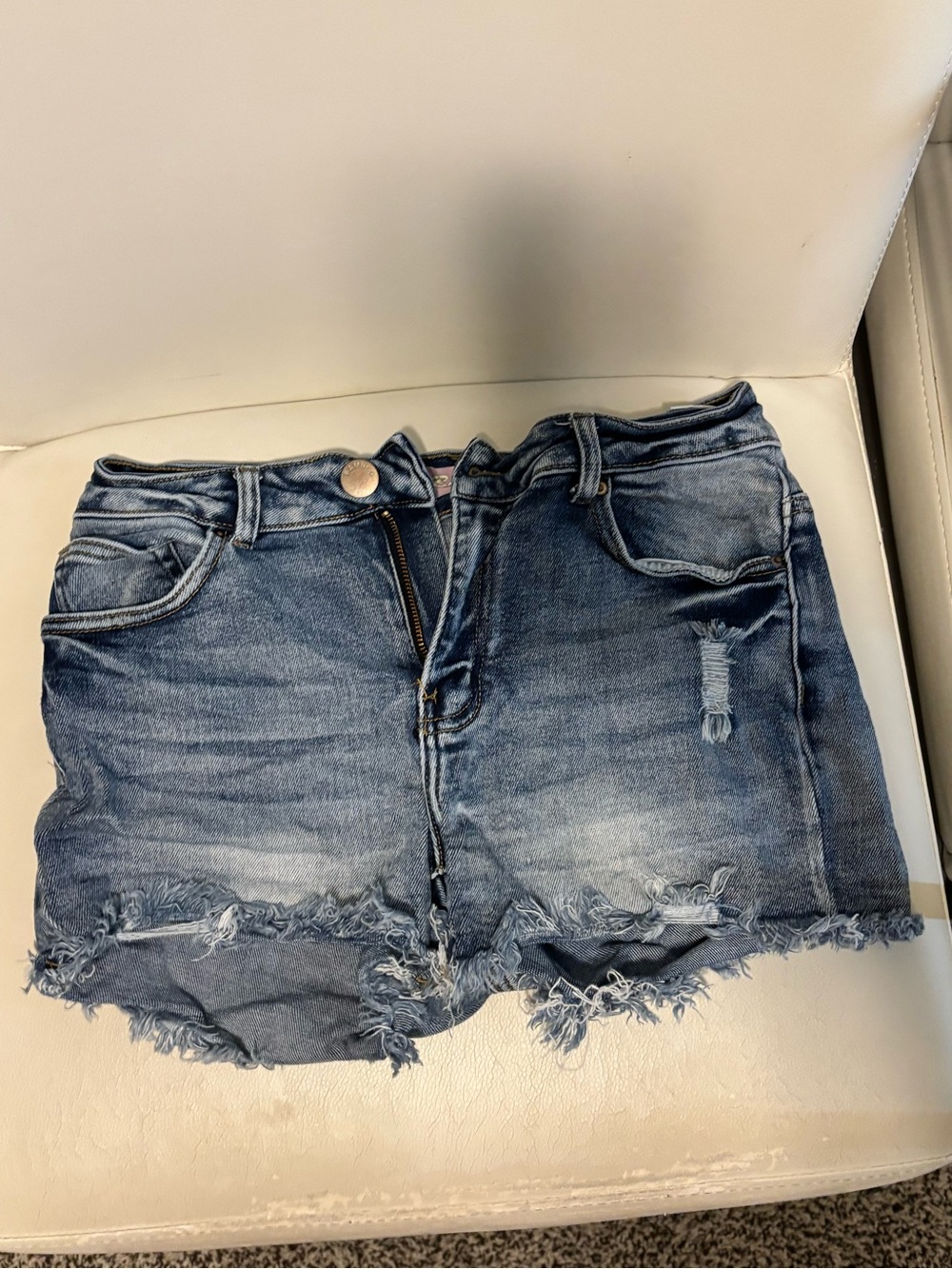 High-Rise Distressed Stretch Denim Shorts